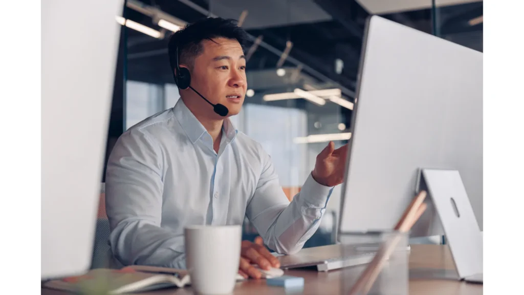 Man attending to customers who have called into the service hotline